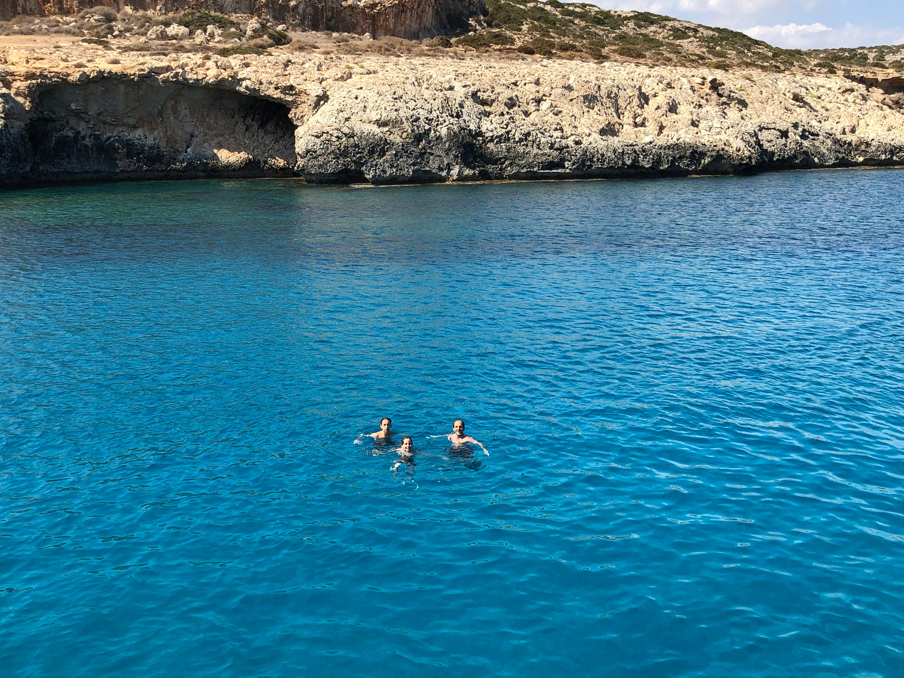 Phil Philips swimming in the blue Lagoon